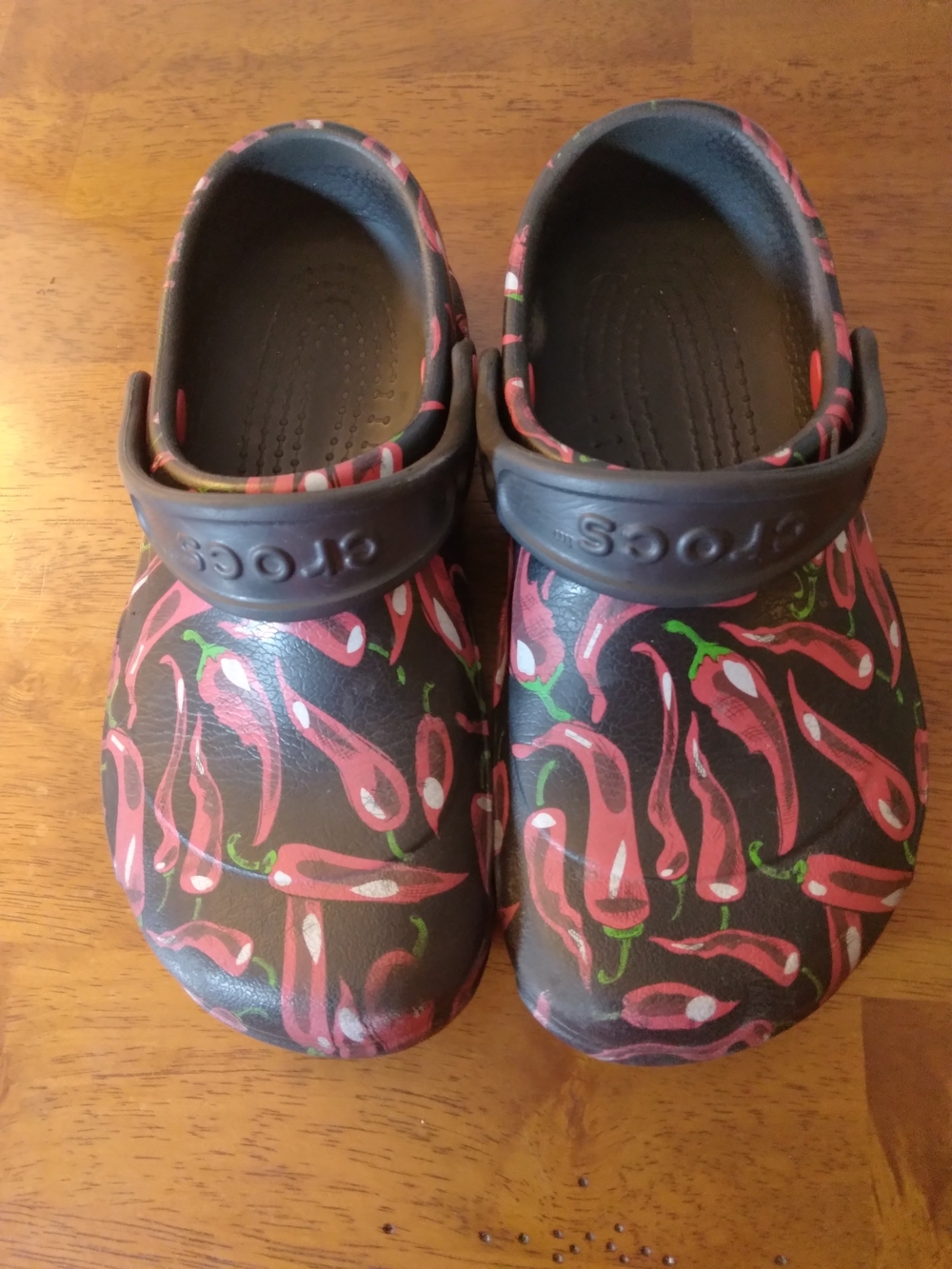 CROCS Kids Chili Pepoer Print Clogs in Black and Red